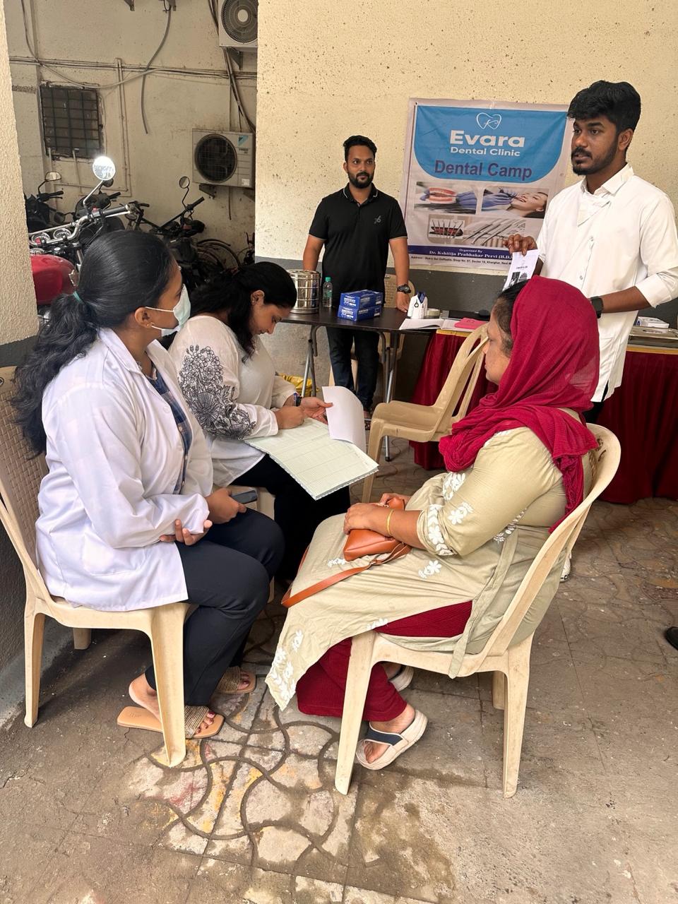 The Evara Dental Clinic team screening residents at a free community dental camp