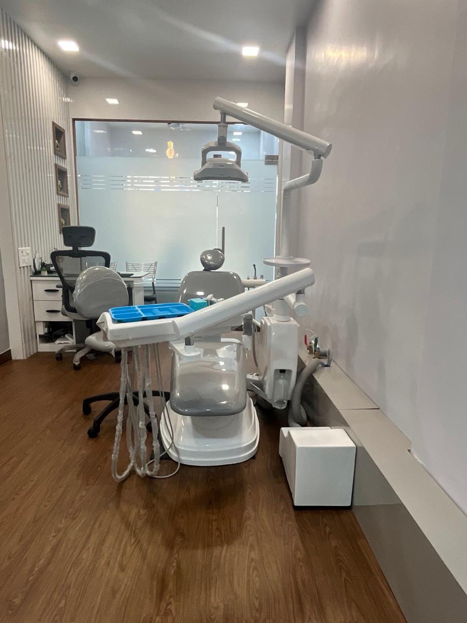 The treatment bay at Evara, looking through to the frosted-glass consultation room